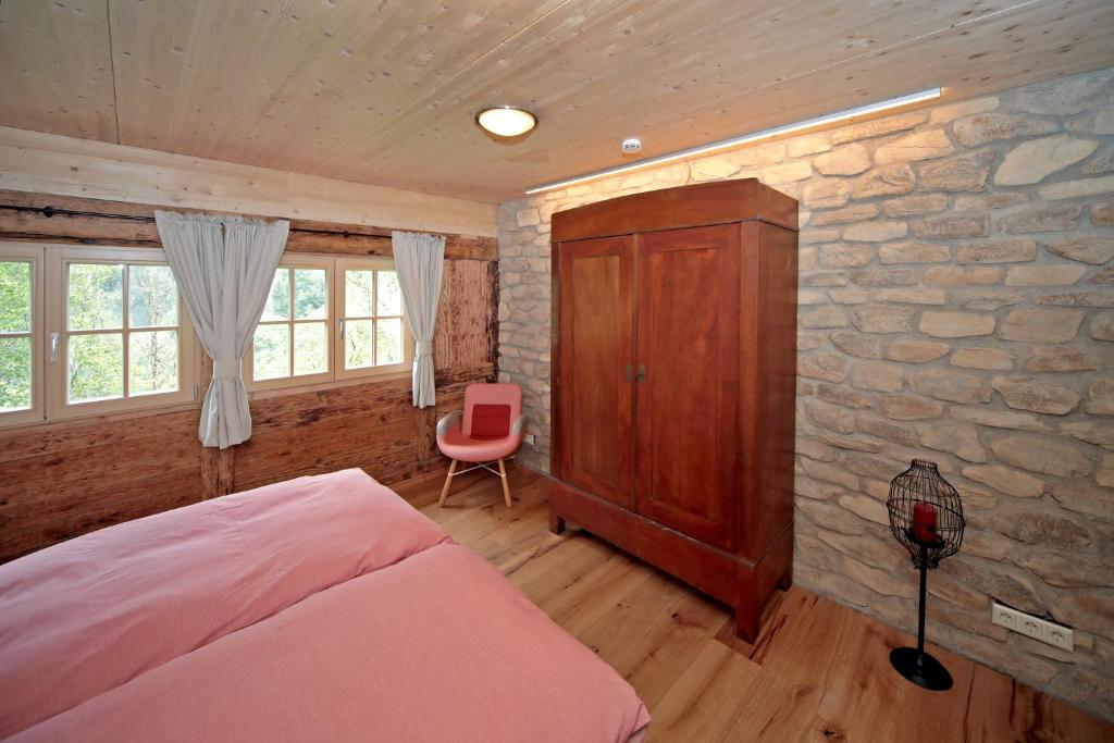 Postel nebo postele na pokoji v ubytování Ferienhaus Haldenmühle - traumhafte Lage mitten in der Natur mit Sauna