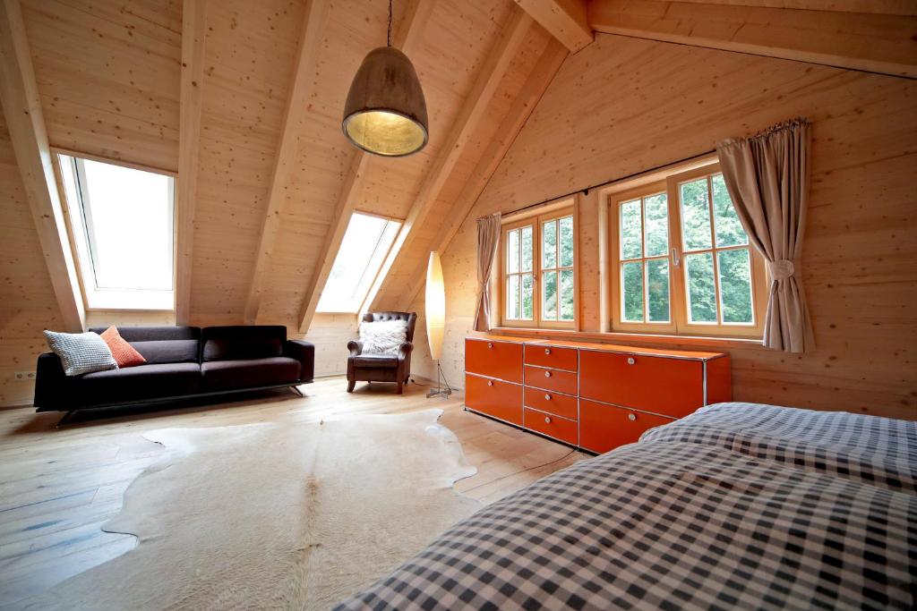 Postel nebo postele na pokoji v ubytování Ferienhaus Haldenmühle - traumhafte Lage mitten in der Natur mit Sauna