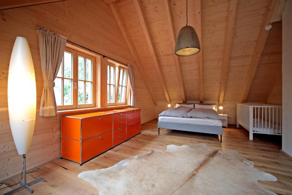 Postel nebo postele na pokoji v ubytování Ferienhaus Haldenmühle - traumhafte Lage mitten in der Natur mit Sauna