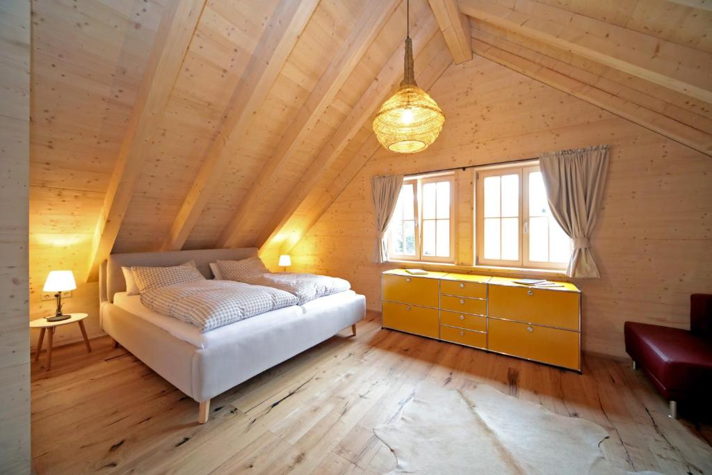 Postel nebo postele na pokoji v ubytování Ferienhaus Haldenmühle - traumhafte Lage mitten in der Natur mit Sauna