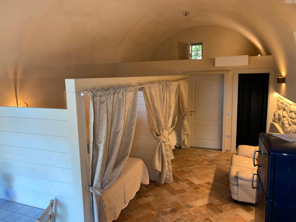 Postel nebo postele na pokoji v ubytování Agriturismo Pratofranco