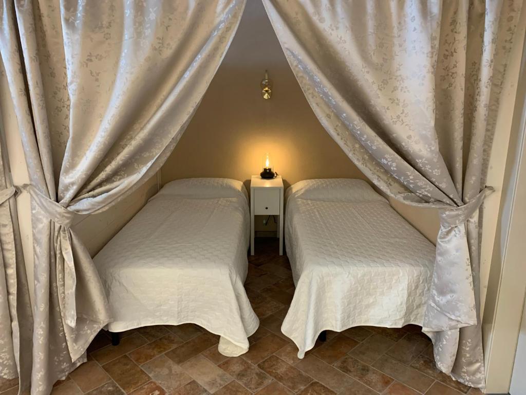 Postel nebo postele na pokoji v ubytování Agriturismo Pratofranco