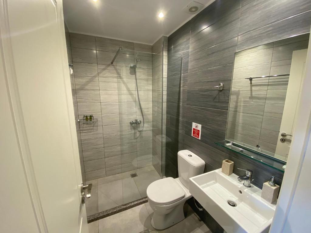 Koupelna v ubytování VIAL Rooms