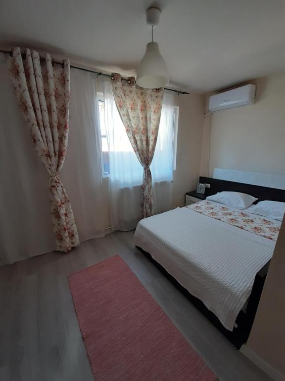 Postel nebo postele na pokoji v ubytování Casa Flamingo