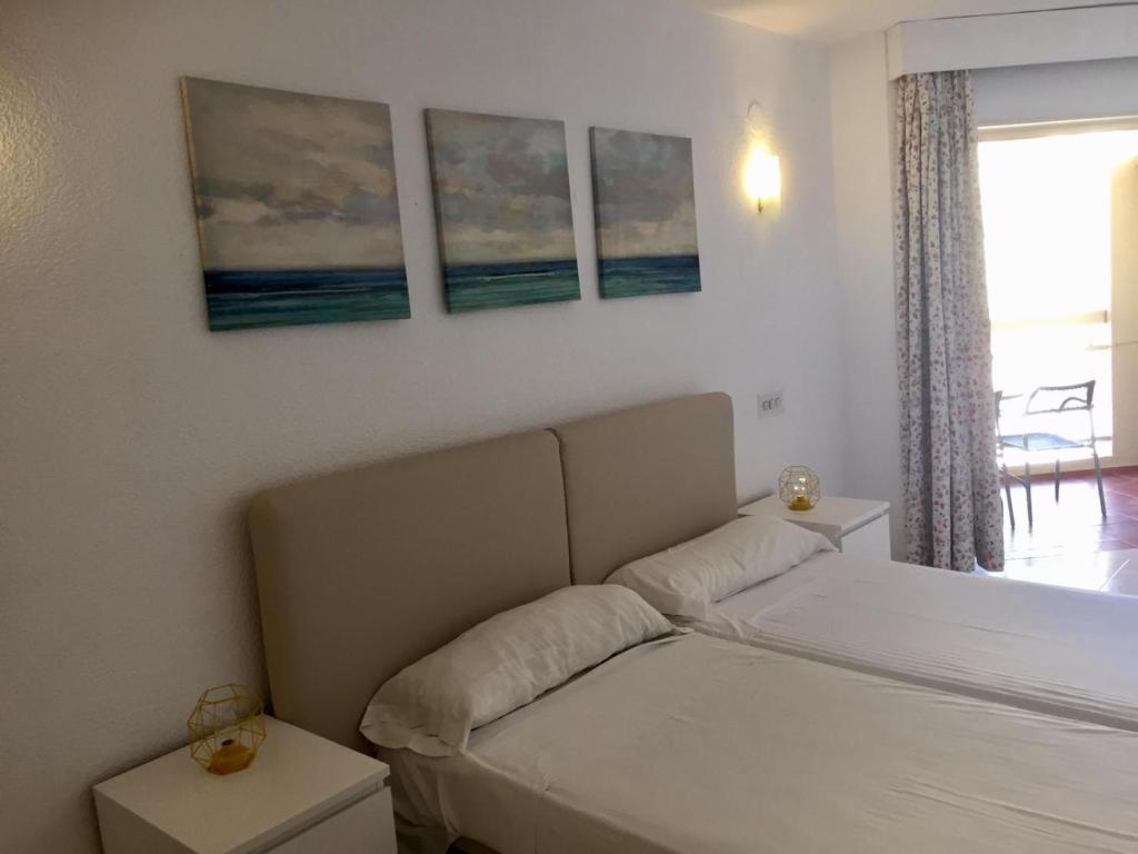 Postel nebo postele na pokoji v ubytování Chinasol Playa