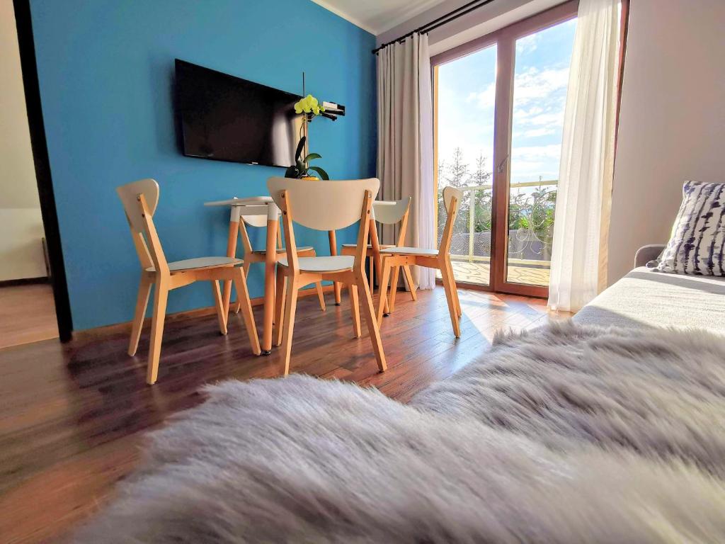 Televízia a/alebo spoločenská miestnosť v ubytovaní To Tu