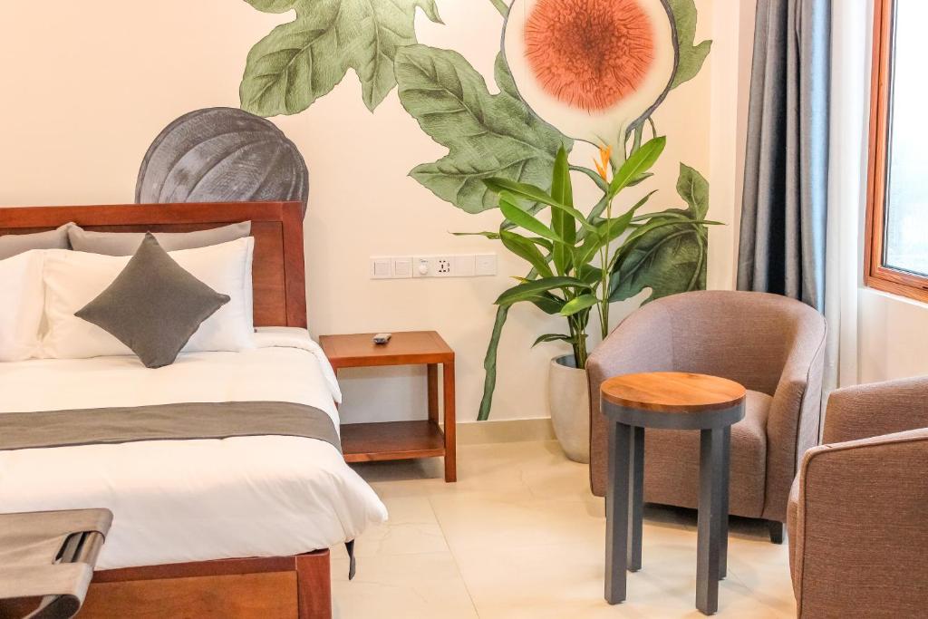 Postel nebo postele na pokoji v ubytování Morven Hotel Colombo