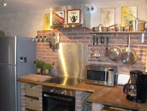 Kuchyň nebo kuchyňský kout v ubytování La Flambée