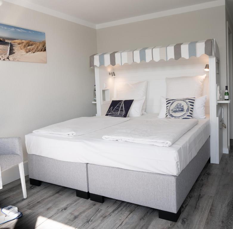 Postel nebo postele na pokoji v ubytování Hotel Deutscher Kaiser