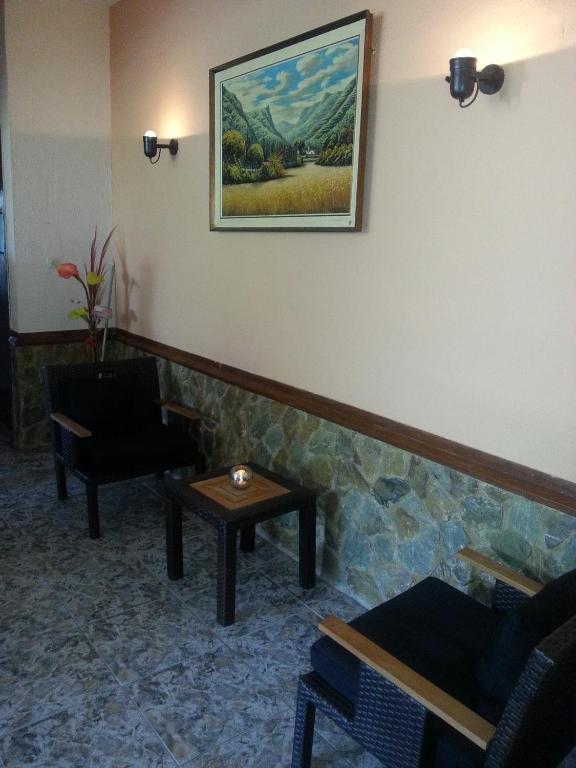 Posezení v ubytování Hostal Los Pinares