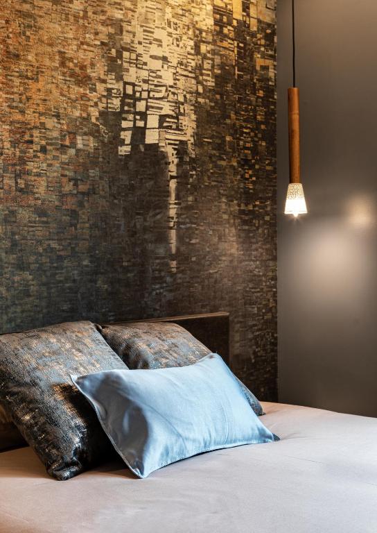 Posteľ alebo postele v izbe v ubytovaní Apartamentos Pensua Sisargas