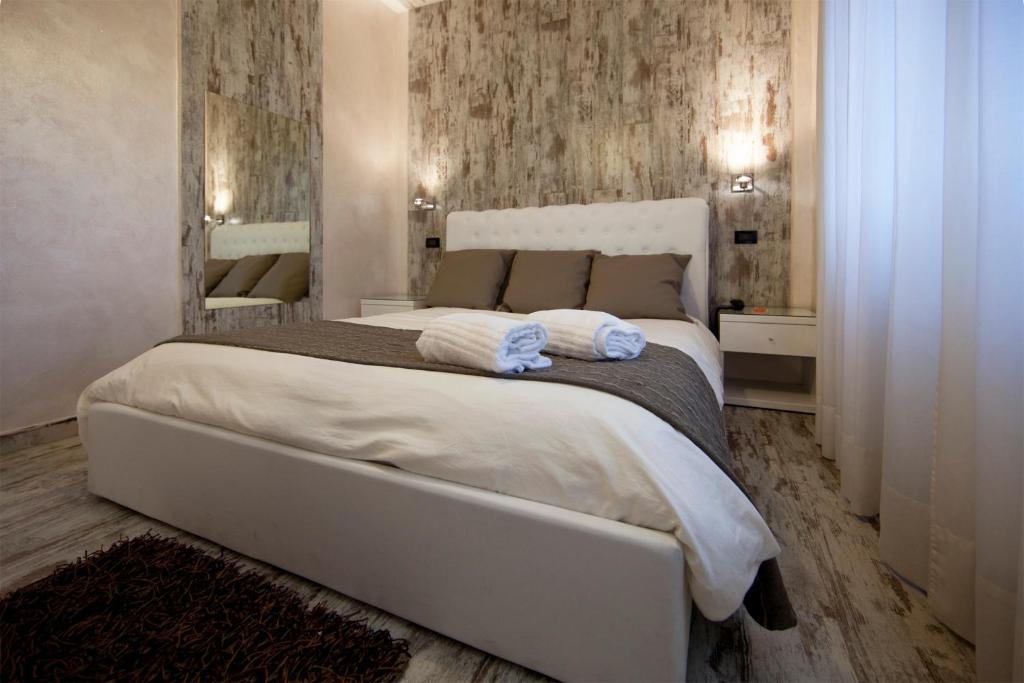 Postel nebo postele na pokoji v ubytování Piccolo Hotel Allamano