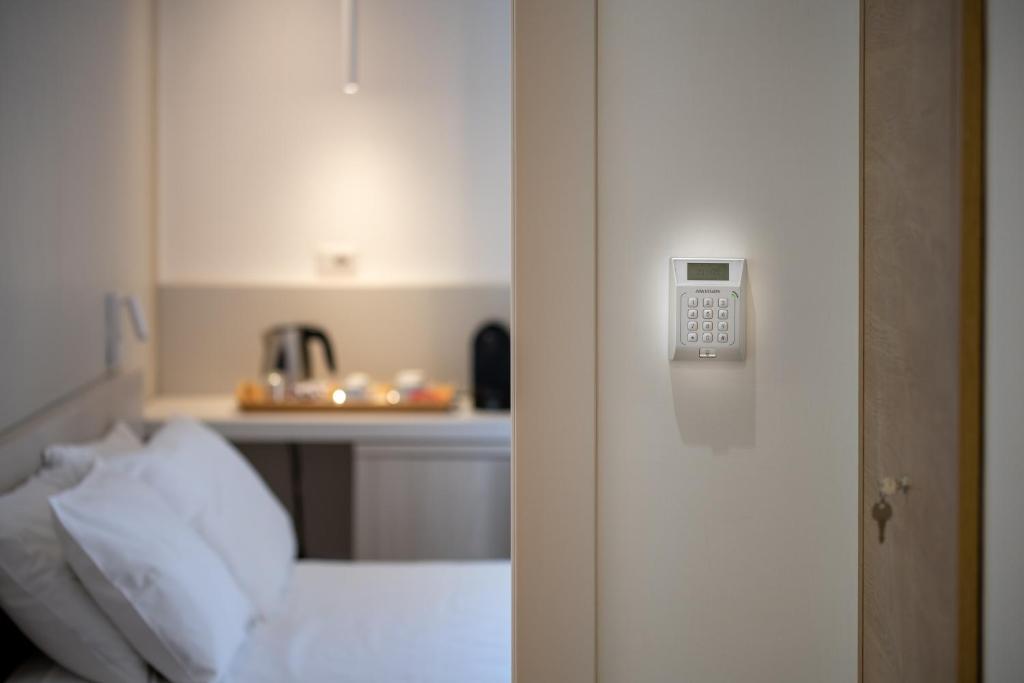 Posteľ alebo postele v izbe v ubytovaní Lux Caracciolo