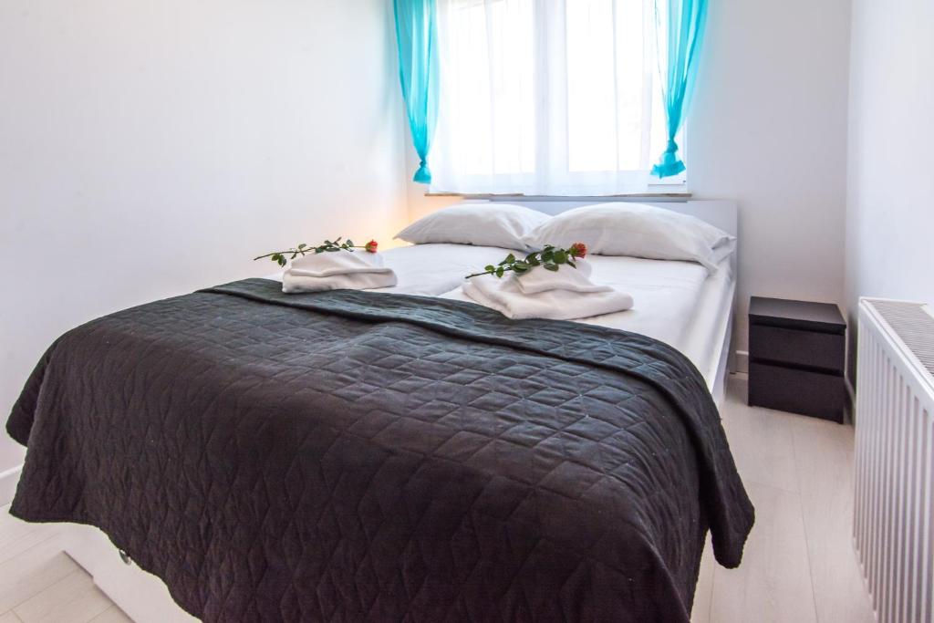 Posteľ alebo postele v izbe v ubytovaní Apartamenty Izerskie - ul. Cicha 13H-I