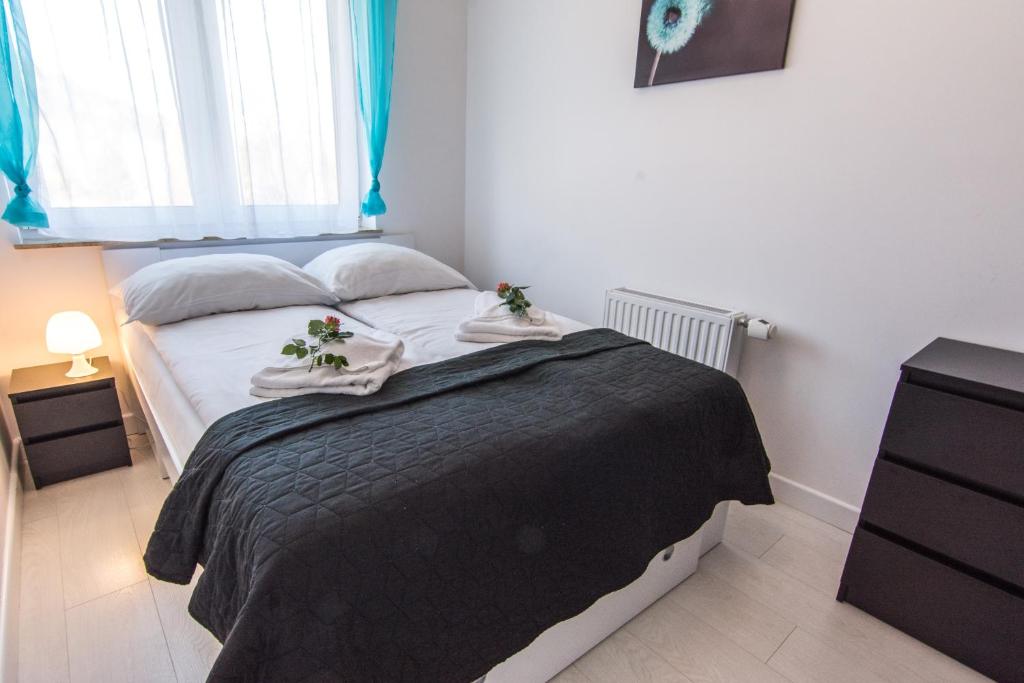 Posteľ alebo postele v izbe v ubytovaní Apartamenty Izerskie - ul. Cicha 13H-I