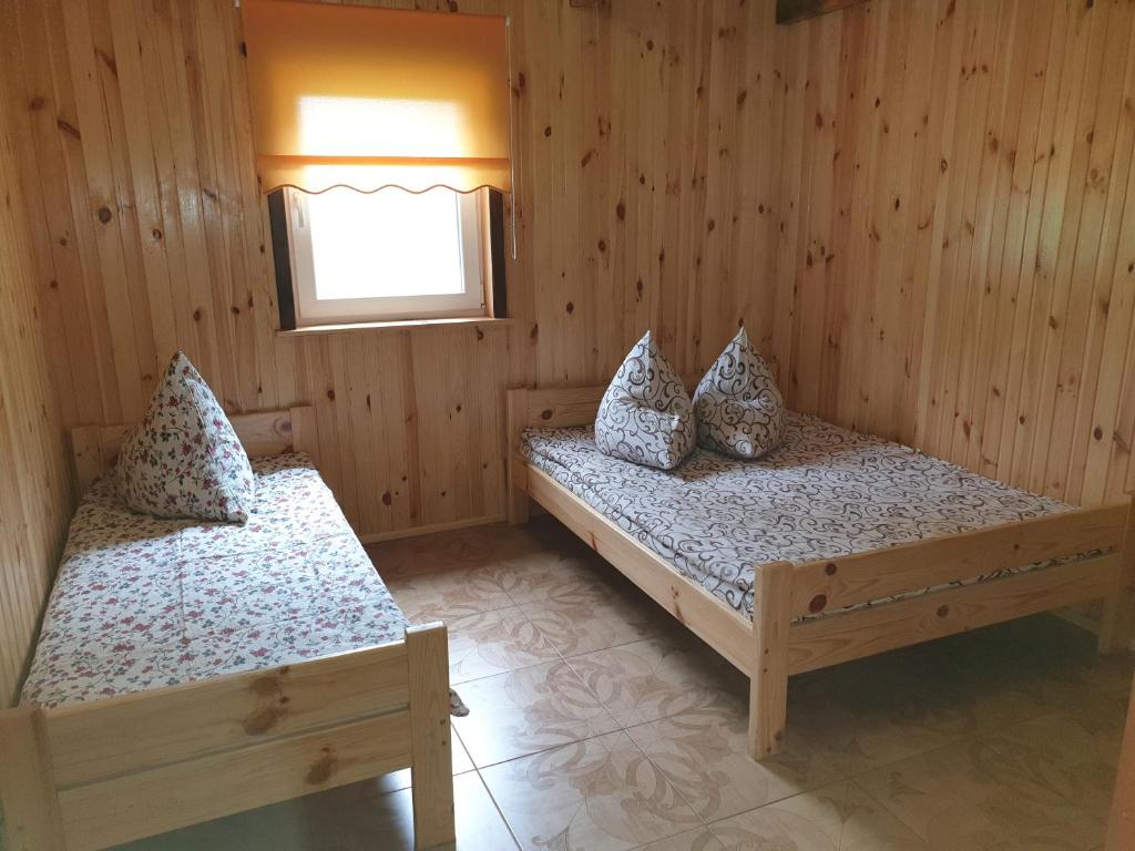 Postel nebo postele na pokoji v ubytování Хуторок