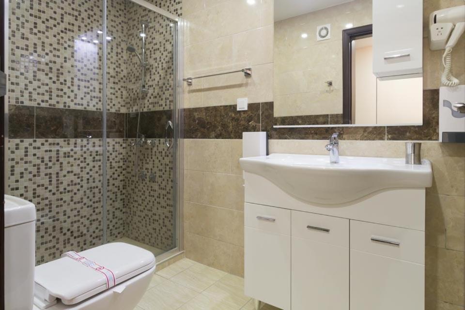 Koupelna v ubytování Hotel Zan