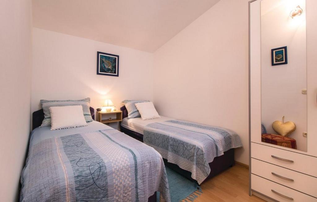 Postel nebo postele na pokoji v ubytování Holiday Home Parada