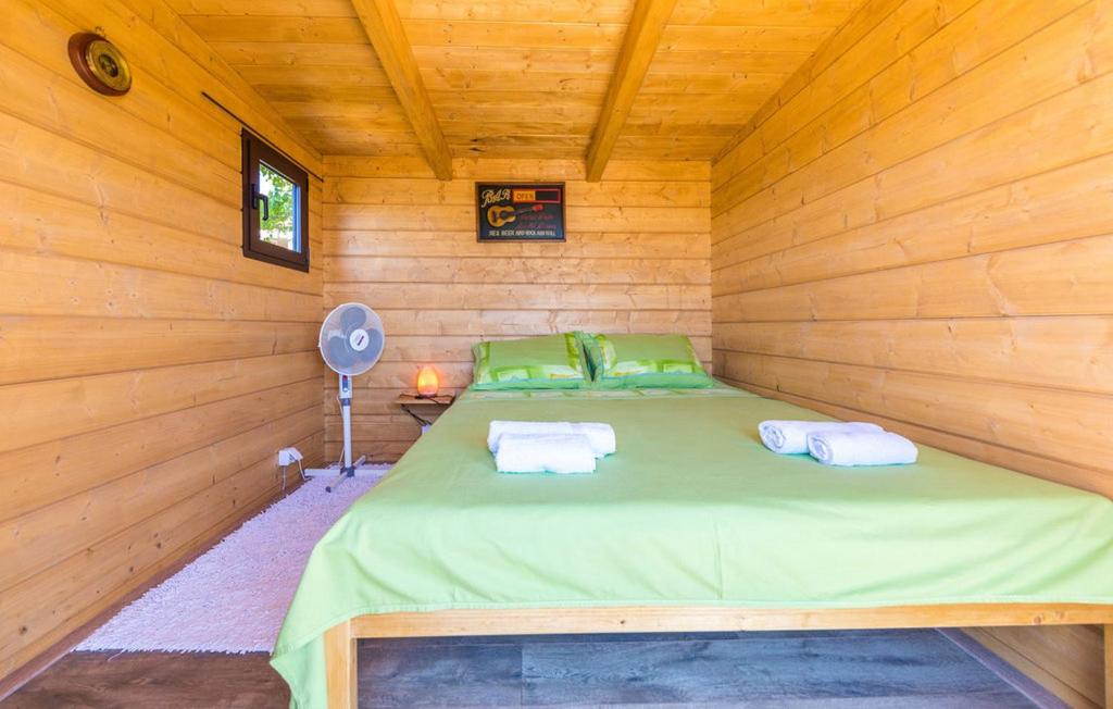 Postel nebo postele na pokoji v ubytování Holiday Home Parada