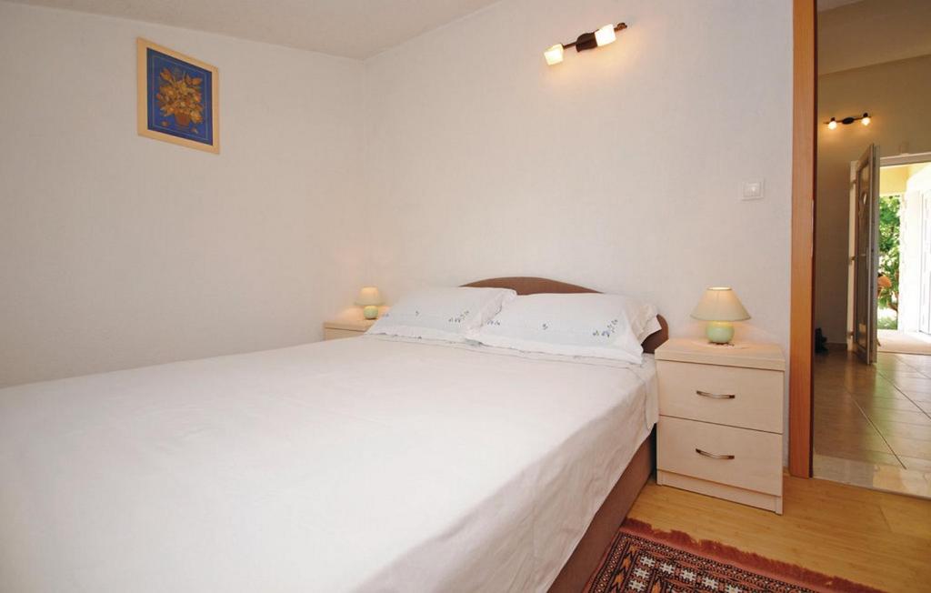 Postel nebo postele na pokoji v ubytování Holiday Home Parada