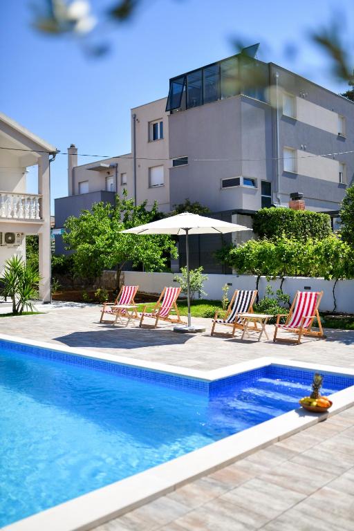 Bazén v ubytovaní Pool house LUKA alebo v jeho blízkosti