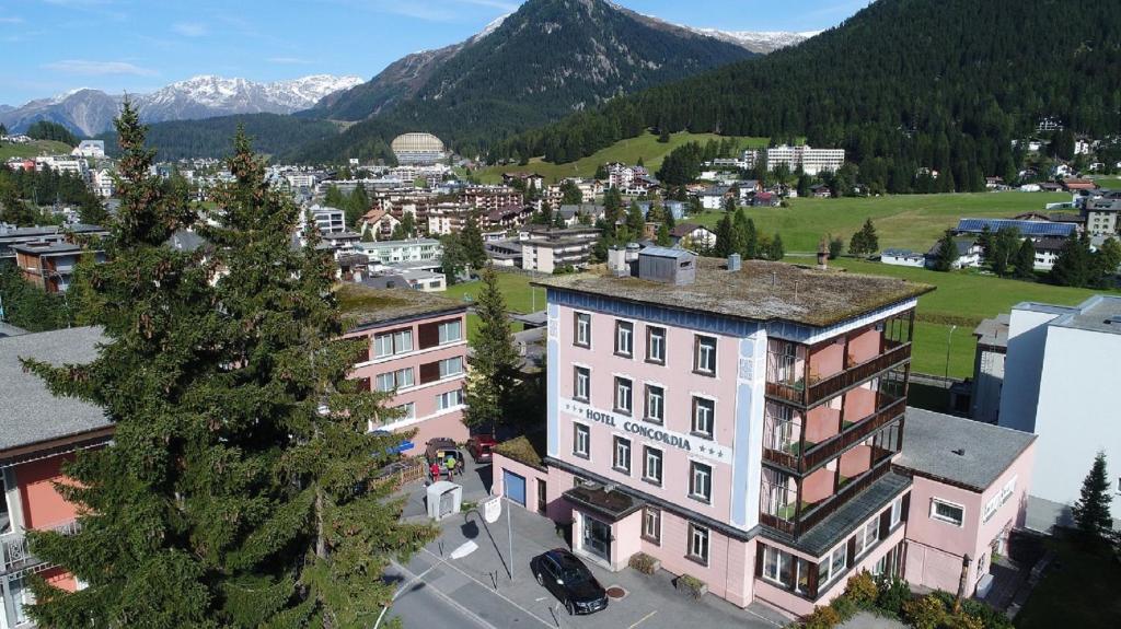 an aerial view of a town in the mountains at Hotel Concordia in Davos