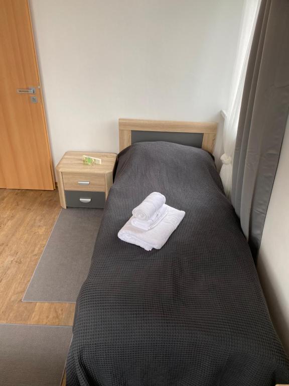 Postel nebo postele na pokoji v ubytování Apartmány Krupka