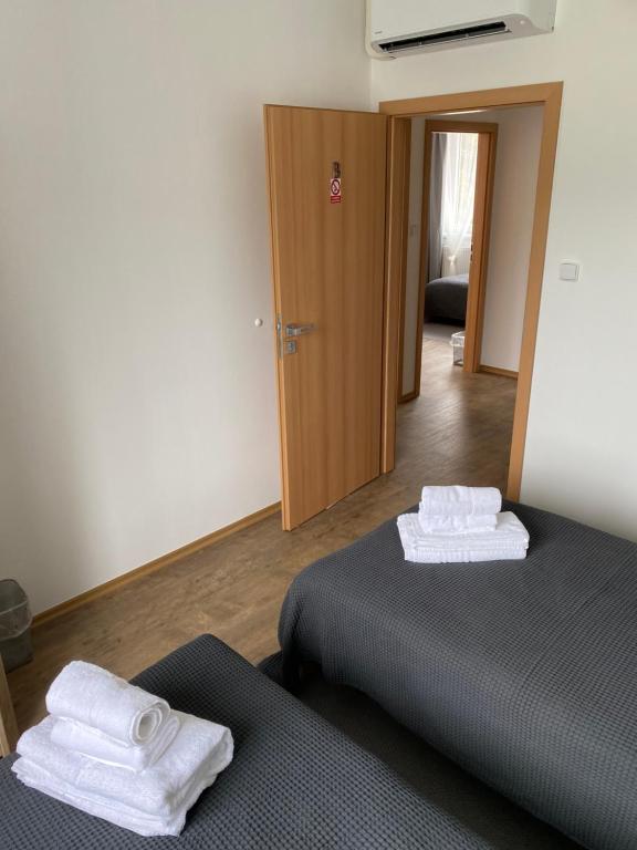 Postel nebo postele na pokoji v ubytování Apartmány Krupka