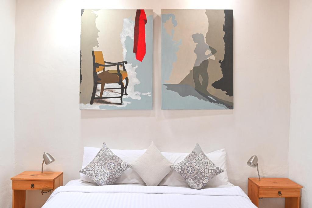 Postel nebo postele na pokoji v ubytování Hotel Meson Cuevano