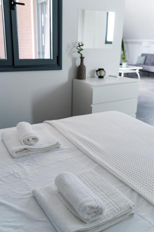 A bed or beds in a room at Villa Sunset Albatross