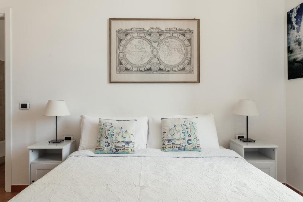 Postel nebo postele na pokoji v ubytování B&B Domus Quiritum