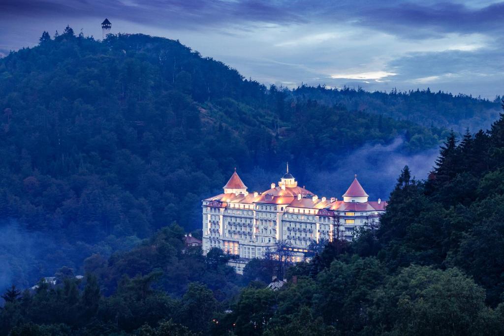a building on the side of a mountain at Spa Hotel Imperial in Karlovy Vary