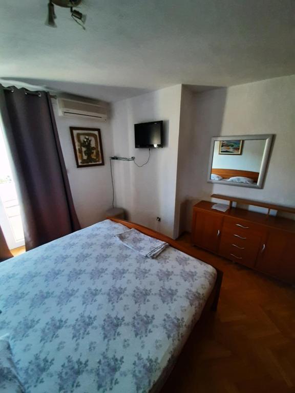 Postel nebo postele na pokoji v ubytování Rooms N&M