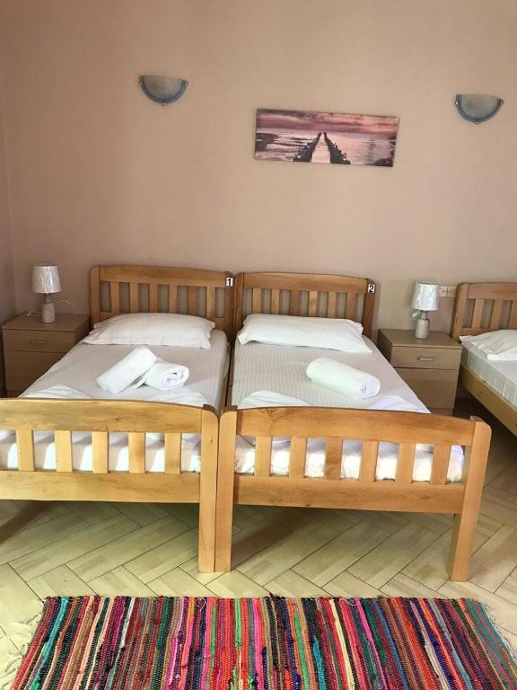 Postel nebo postele na pokoji v ubytování Hotel Durres Vila 53