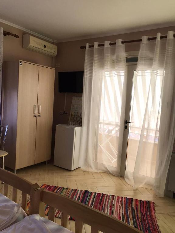 Postel nebo postele na pokoji v ubytování Hotel Durres Vila 53