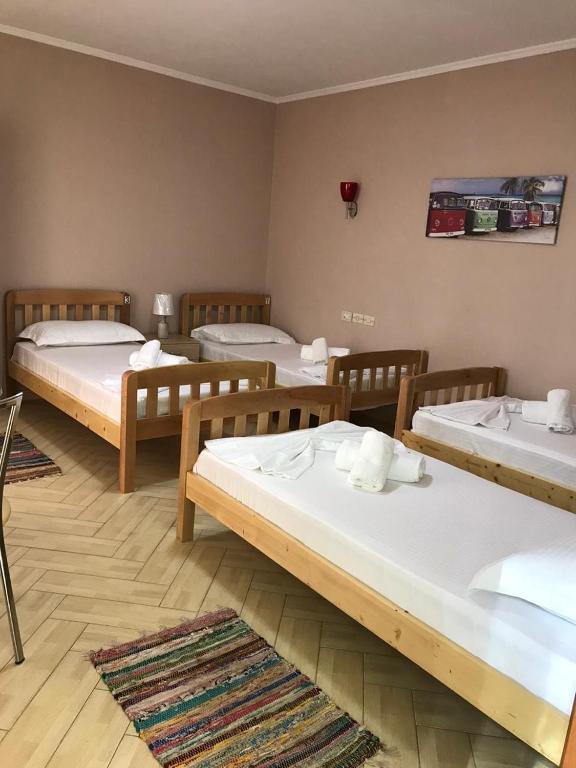Postel nebo postele na pokoji v ubytování Hotel Durres Vila 53