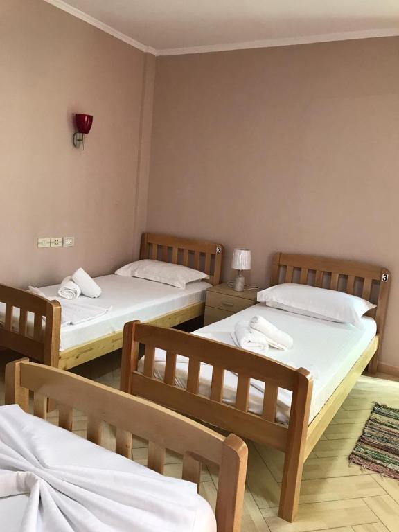 Postel nebo postele na pokoji v ubytování Hotel Durres Vila 53