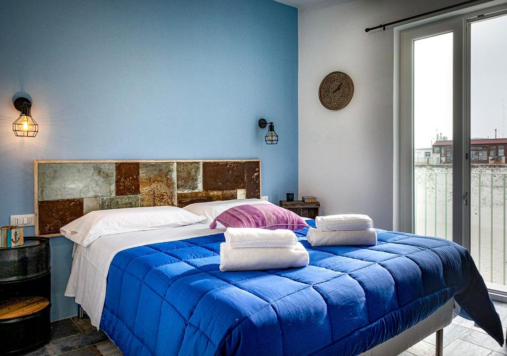 Postel nebo postele na pokoji v ubytování b&b fico d'india