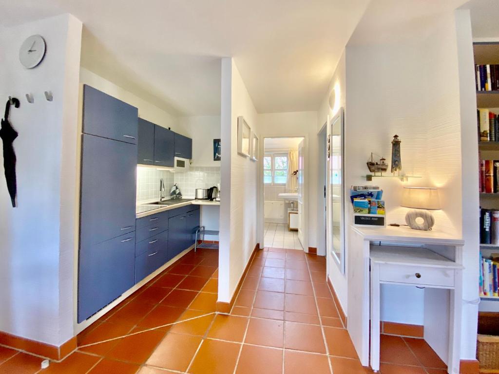 Kuchyň nebo kuchyňský kout v ubytování Strandnahe Ferienwohnung Rügen