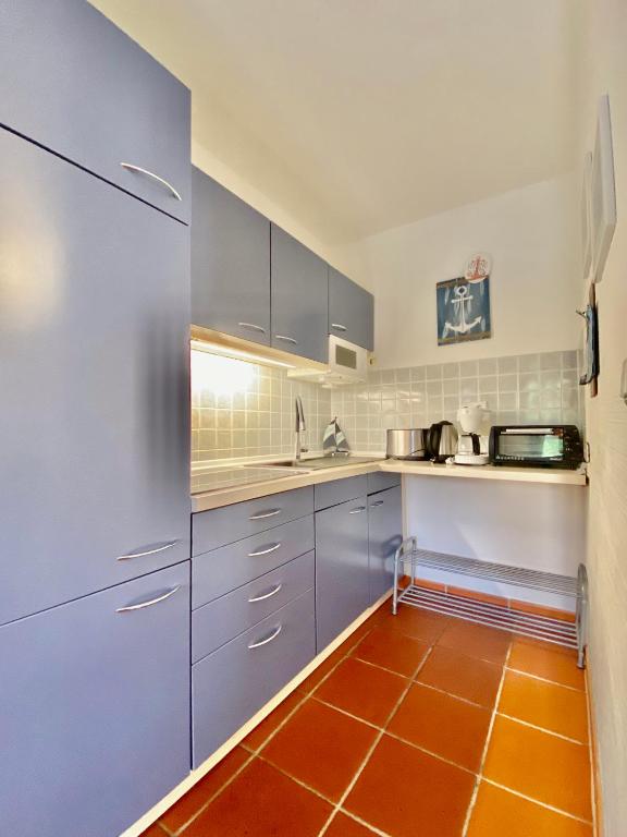Kuchyň nebo kuchyňský kout v ubytování Strandnahe Ferienwohnung Rügen