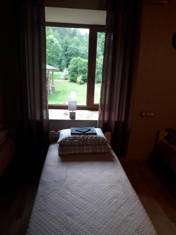Postel nebo postele na pokoji v ubytování PATMALAS