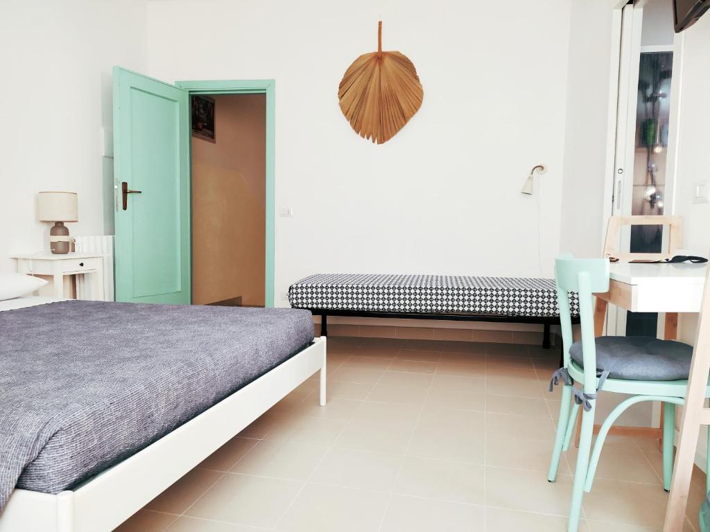 Postel nebo postele na pokoji v ubytování Lo Spicchio b&b