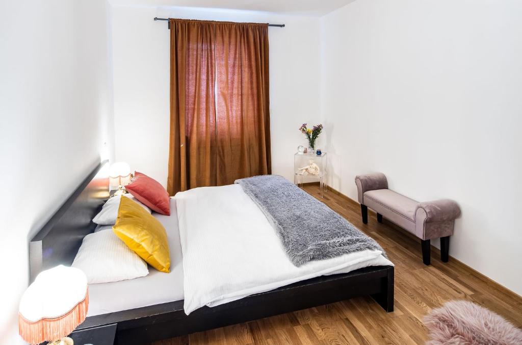 Postel nebo postele na pokoji v ubytování Silvie Apartments - Zlaté Terasy
