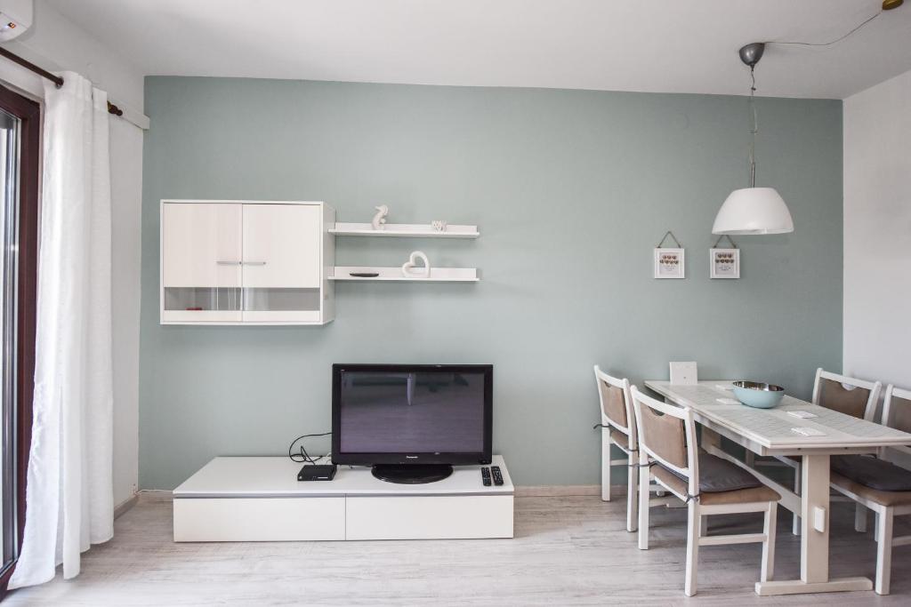 Telewizja i/lub zestaw kina domowego w obiekcie Apartment Sandrina