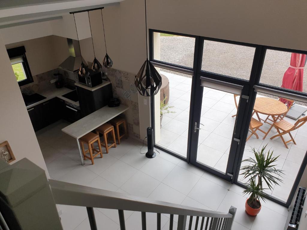 an aerial view of a kitchen and living room with a window at L' Albizia in Pintheville