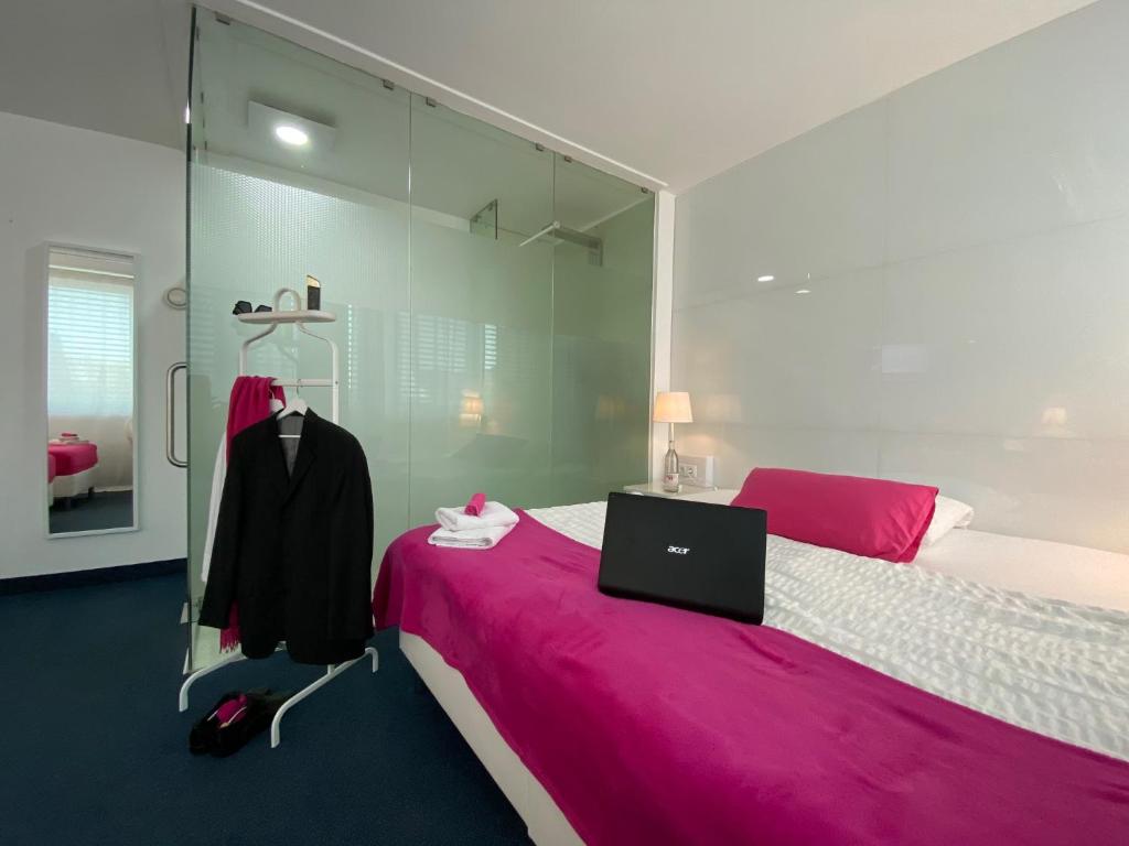 Postel nebo postele na pokoji v ubytování Business Hotel Wiesbaden PRIME