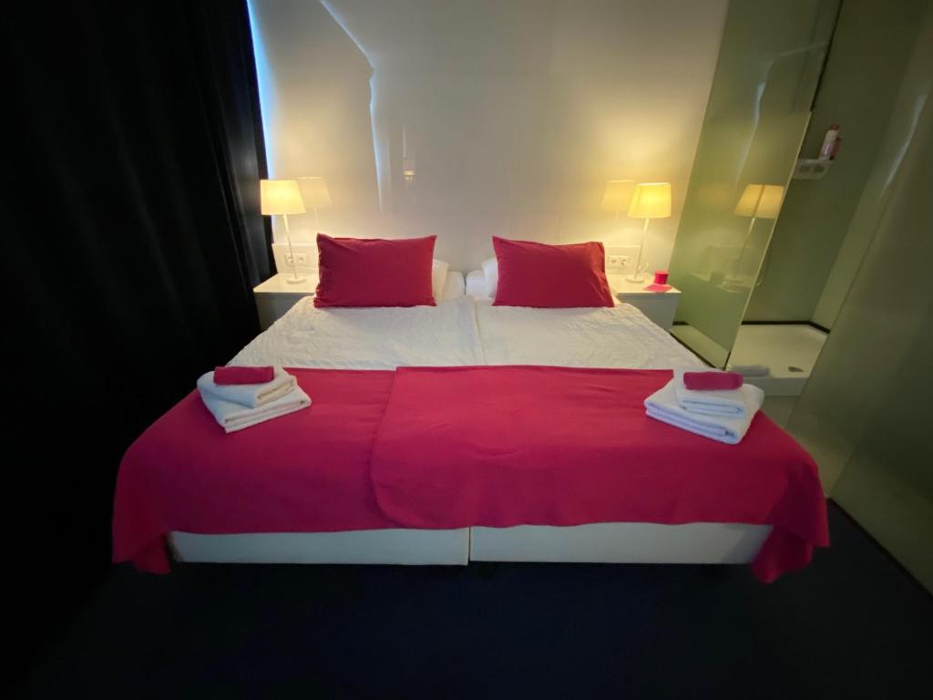 Postel nebo postele na pokoji v ubytování Business Hotel Wiesbaden PRIME