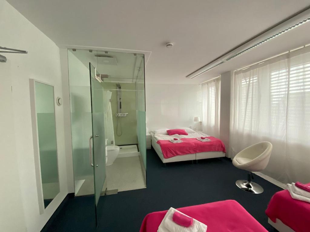 Postel nebo postele na pokoji v ubytování Business Hotel Wiesbaden PRIME
