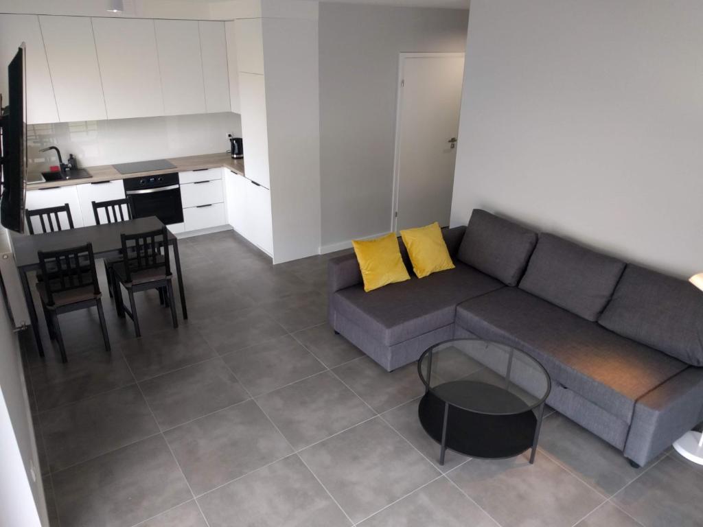Kuchyňa alebo kuchynka v ubytovaní Apartamenty Słoneczna 42
