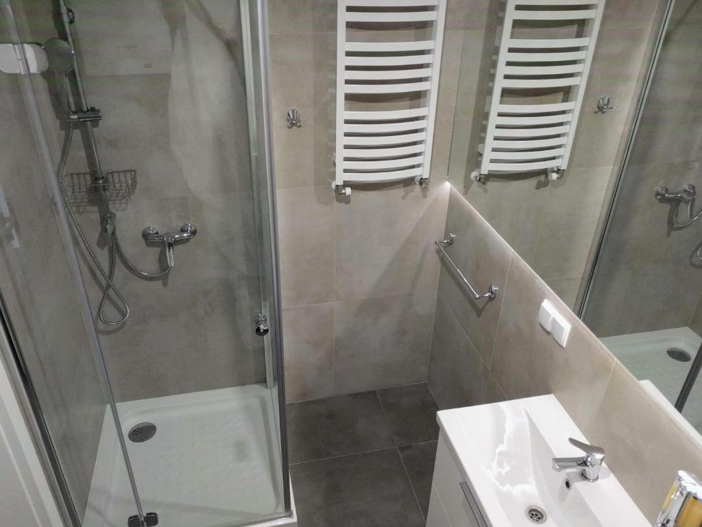 Kúpeľňa v ubytovaní Apartamenty Słoneczna 42